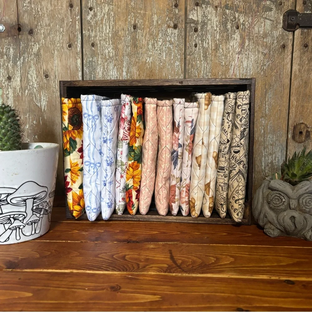 Quilted embroidered pearl snap kindle/E reader sleeve.